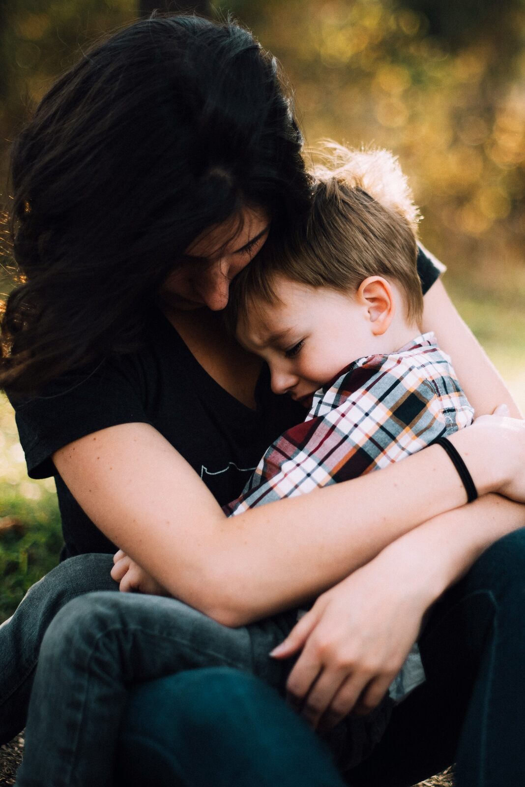 A mother comforting her child